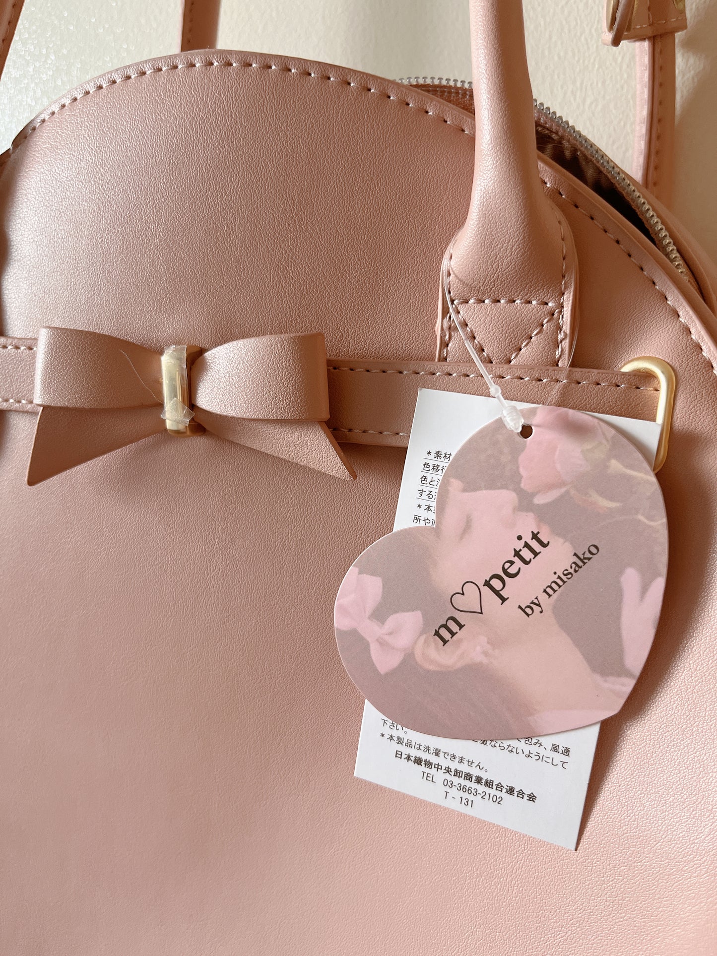 m♡petit dusty pink circle purse